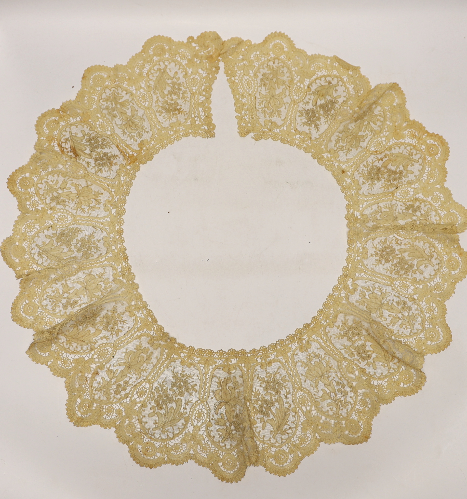 A long 19th century mixed Brussels lace collar, with 20 needle lace oval insertions, a similar wider Honiton bobbin lace collar and a machine lace bonnet veil